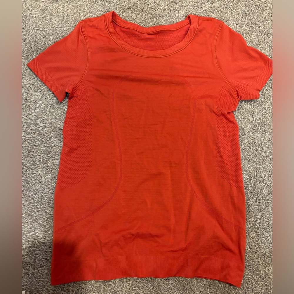 Orange/red swiftly tech size 6